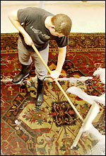 Washing an Oriental rug at the Textival facility in New Mexico
